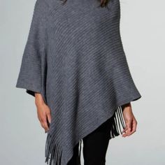 The Gray Riley Poncho can be worn for fashion, warmth, and comfort during the fall and winter months. Add a stylish touch to an outfit for any occasion—an casual evening out, at the office, or for a casual weekend brunch. Poncho is one size fits most and is made of 100% Acrylic 27.5" x 27.5" Colors: Gray Material: 100% Acrylic Care: Hand Wash One Size Fits Most Casual Evening, Weekend Brunch, Casual Weekend, The Gray, Winter Months, Fall And Winter, The Fall, The Office, Hand Wash