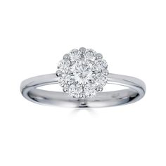 a white gold ring with an oval shaped diamond in the center and round brilliant cut diamonds on each side