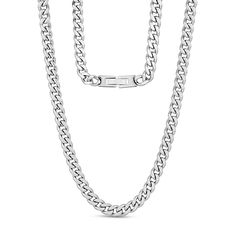 There is a lot to love about this classic Cuban link chain necklace. This is a necklace without embellishments, but that does not mean that it is a boring piece. To the contrary, the Cuban link chain provides a striking look, creating clean lines and some weight. The necklace is made from stainless steel, which is an excellent choice. Not only is stainless steel a durable choice, but it is also an attractive one. The finish resists tarnish, and you can count on this necklace being a wardrobe sta Classic Silver Cuban Link Chain Necklace, Classic Metal Cuban Link Necklace, Modern Necklace With Solid Cuban Link Construction, Classic Stainless Steel Cuban Link Necklace With Curb Chain, Classic Stainless Steel Cuban Link Necklace, Classic Link Chain Necklace In Stainless Steel, Silver Cuban Link Necklace, Classic Stainless Steel Link Chain Necklace, White Gold Metal Necklace With Curb Chain