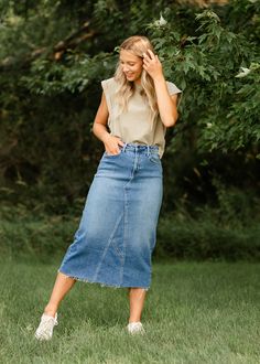 Let us introduce you to the denim skirt you'll want to wear with everything, the Lee A-Line Raw Hem Midi Skirt! This stunning midi denim skirt is an Inherit Design made in the USA! Crafted from high quality, stretchy, medium wash denim that is super soft and will keep you comfortable all day long. The A-line fit is walkable, modest, and on-trend with a raw hem. This sustainable, modest, American-crafted skirt is a true seasonless staple you will wear for years to come! Style | Midi, Denim Color Dark Wash Midi Skirt For Spring, Casual Medium Wash Denim Midi Skirt, Spring Dark Wash Midi Skirt, Relaxed Fit Straight Leg Denim Skirt For Fall, High Rise Medium Wash Skirt For Fall, Fall Relaxed Straight Leg Denim Skirt, Casual Dark Wash Midi Denim Skirt, Spring Medium Wash Denim Midi Skirt, Relaxed Fit Denim Skirt For Fall