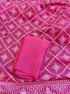 A very very pretty Chikankari saree in pure georgette in a lovely candy pink shade with all over jaal (barfi pattern) embroidery with mukaish work (embellishments). The pallu is short but features intricate designs. The entire saree has the same pattern from the very beginning of the saree except the portion you have to tuck in so that it doesn't bulge. Entire saree is framed in cord piping, best quality satin falls are attached and picot stitching is done as well. The blouse piece is separated Festive Pink Salwar Kameez With Chikankari Embroidery, Pink Chikankari Embroidery Salwar Kameez For Festive Occasions, Pink Saree With Motifs For Festivals, Pink Traditional Wear With Motifs For Navratri, Pink Saree With Motifs For Eid, Pink Traditional Wear With Motifs For Eid, Pink Chanderi Dupatta With Chikankari Embroidery, Pink Salwar Kameez With Chikankari Embroidery, Traditional Pink Salwar Kameez With Chikankari Embroidery