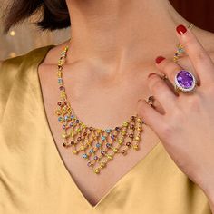 Ross-Simons - 22.70ct t. w. Multi-Gemstone Bib Necklace Over Sterling. 18". It's your time to shine! Bask in an eye-catching cascade of color and shine. Our fabulous bib necklace features a flexible design bright with 22.70 ct. tot. gem wt. round gems of citrine, amethyst, peridot, garnet and London blue topaz. Set in polished 18kt yellow gold over sterling silver. Graduates from 3/16" to 1 3/4" wide. Curb chain. Lobster clasp, multi-gemstone bib necklace. Garnet birthstones are the perfect gift Garnet Birthstone, Sterling Jewelry, Flexible Design, London Blue Topaz, Bib Necklace, London Blue, Curb Chain, Free Jewelry, Blue Topaz