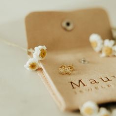 The Flower Mini Studs are the perfect, dainty earring that goes with everything! They are gold vermeil and are hypoallergenic, tarnish and wear resistant, and perfect for sensitive ears. They measure a dainty 5mm and are perfect for a first piercing or as a second/third piercing. Dainty Yellow Gold Cartilage Earrings For Everyday, Tarnish Resistant 14k Gold Filled Cartilage Earrings For Gift, Delicate Tarnish Resistant Huggie Earrings, Dainty Yellow Gold Huggie Earrings, Delicate Yellow Gold Huggie Earrings, Dainty Birth Flower Earrings For Mother's Day, Dainty Huggie Earrings For Gift, Delicate Yellow Gold Huggie Earrings For Gift, Delicate Yellow Gold Huggie Earrings As Gift