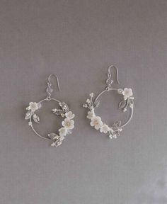 Bridal Statement Earrings Floral Bridal Earrings. Statement | Etsy Elegant Metal Hoop Flower Earrings, Elegant Pierced Hoop Flower Earrings, Flower Shaped Clip-on Wedding Jewelry, Wedding Crystal Earrings In Metal, White Clip-on Hoop Earrings For Gift, White Clip-on Hoop Earrings As Gift, Dangle Metal Flower Earrings For Wedding, Metal Dangle Flower Earrings For Wedding, Delicate Handmade Hoop Earrings For Wedding