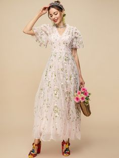 Our Eve Vintage Dress is artfully detailed with delicate embroidery through a flowing midi skirt. It's crafted from comfortable fabric and is decorated with close ruffles and puff sleeves which is giving a splendid look. Specifications: Silhouette: A-Line Material: Mesh Elasticity: Non Strech Dresses Length: Ankle-Leng Pink Mesh Dress, Strech Dresses, Delicate Embroidery, Peplum Jacket, Mob Dresses, Khaki Dress, Embroidery Fashion, Trendy Tops, Mesh Dress