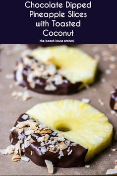 chocolate covered pineapple slices on a baking sheet