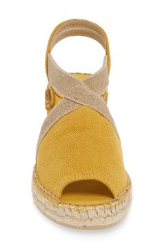 A jute-wrapped wedge and platform further the breezy warm-weather style of a casual-chic sandal. 1 1/4" heel; 1" platform (size 8-8.5US / 39EU) 3" strap height Slip-on style Textile upper and lining/synthetic sole Made in Spain Women's Shoes Spring Woven Jute Sandals, Canvas Open Toe Wedge Sandals For Spring, Canvas Wedge Sandals With Round Toe For Summer, Spring Canvas Open Toe Wedge Sandals, Summer Canvas Sandals For Beach, Summer Closed Toe Canvas Wedge Sandals, Closed Toe Canvas Wedge Sandals With Woven Sole, Canvas Wedge Heel Sandals For Spring, Summer Canvas Wedge Sandals With Closed Toe