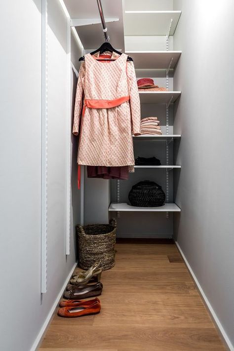 a grey narrow closet with open shelves and railing, a basket for various stuff is a small and laconic space to store your clothes Small Deep Closet, Long Narrow Closet, Narrow Walk In Closet, Narrow Closet Design, Small Closet Design, Narrow Closet, Mini Closet, Deep Closet, Closet Design Ideas