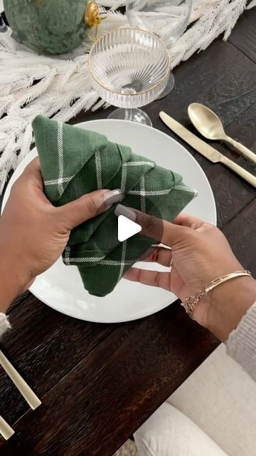 Danielle Green | Home & Lifestyle Creator on Instagram: "Follow and comment SEND for steps and napkin recommendations! ✨This napkin folding technique is such a cute way to elevate and decorate your holiday tablescape! Plus it’s so simple. I’ve included the steps/tips below on how to do it and what type of napkin I used.  Use a cloth 20 x 20 size napkin Fold napkin in half then in half again to make a square shape Turn the napkin so the open corners are at the top  Fold each corner up in a staggering pattern Fold the top left and right corners back to make a peak of the tree shape Tuck each open corner under to make a fold for each layer of the tree You’re done! ✨  https://liketk.it/4VMuD  #christmasdecor #holidaydecor #christmas #holidays #homedecor #homedesign #homedecoration #homeinspira How To Fold A Cloth Napkin Like A Christmas Tree, How To Fold Napkins Like Christmas Trees, Tree Folded Napkin, How To Fold Napkins Like A Christmas Tree, Table Settings Napkins Cloth, Fold Napkins Like Christmas Tree, Fold Square Napkin, Folding Christmas Tree Napkins, Napkin Cloth Folding