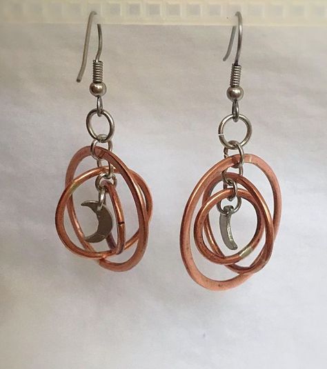 handmade jewelry design earrings #jewelry #handmadejewelry #handmade #DIY #metal #wire #copper #silver #moon #crescent #space #planet #earrings Planet Earrings, Hardware Jewelry, Wire Earring, Moon Crescent, 3d Printing Pen, Earrings Wire, Jewelry Design Earrings, Diy Metal, Handmade Jewelry Designs