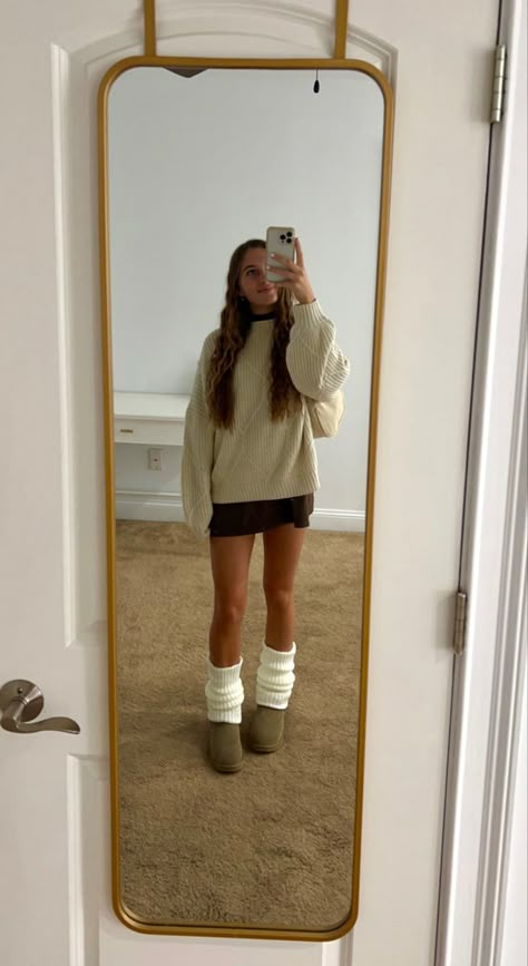 Leg warmers outfit brown dress with cream sweater and Uggs Uggs outfit Cute Fall Outfit Inspiration, Belly Thanksgiving Outfit, Fall Dress Outfit Aesthetic, Sweater Dress With Leg Warmers, Leg Warmer And Boots, Outfits To Wear On Thanksgiving, Tasman Uggs And Leg Warmers, Fall Outfits Dresses Boots, Cool Girl Thanksgiving Outfit