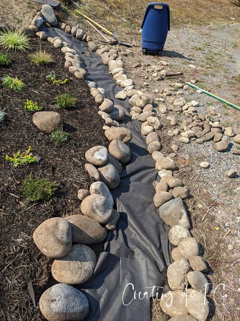 How To Build A Dry Creek Bed For Drainage, Dry Beds For Drainage, Dry River Bed Front Yard, Backyard Dry Creek Bed, Stone River Garden Dry Creek Bed, River Rock Dry Creek Bed, Well Head Landscaping, Diy Dry Stream Bed, Rain Chain Dry Creek Bed