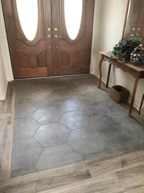 home entryway tile design Tile And Wood Front Entrance, Tiles Mixed With Wood Floor, Porcelain Tile Floor Entryway, Tile Entrance To Wood, Wood Tile Floor Whole House, Foyer Tile Ideas Entryway Hexagon, Tile In Basement Floor, Blended Tile And Wood Floor, Hexagon Tile Foyer