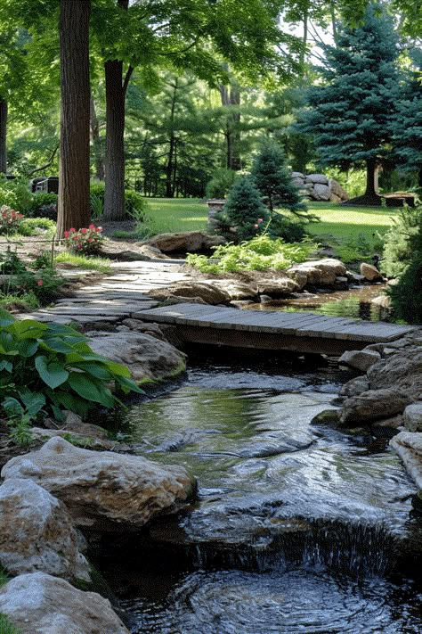 22 Innovative Backyard Stream Ideas (With Pictures) Creek Garden Ideas, Lakeside Backyard Ideas, Building A Bridge Over A Creek, Landscape Stream Ideas, Large Garden Pond Ideas, Garden With Stream, Water Creek Landscaping, Natural Stream Landscaping, Backyard With Creek