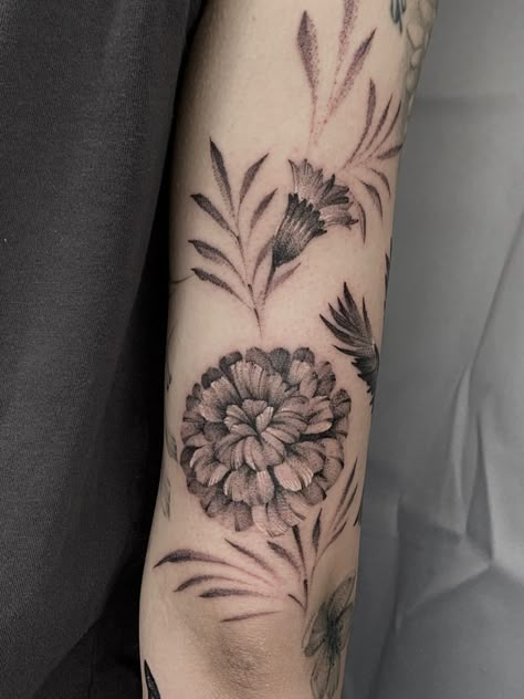 Marigold flower tattoo One of the hardest flowers to Execute in my style By Faisal Al-lami @tattoo.sal  ——- #dallastattooartist #dallastattoos #art #drawing #inked #blackandgreytattoo #dfwtattoos #sleevetattoo #marigold #marigoldtattoo #floraltattoo #flowertattoo #dallasyoga #dallasfitness #microrealism Marigold Mandala Tattoo, Black And Grey Marigold Tattoo, Marigold Flower Tattoo Sleeve, Marigold Black And White Tattoo, Marigold Flowers Tattoo, Black Marigold Tattoo, Tattoo Marigold Flower, Marigold Tattoo Design Black And White, Black And White Marigold Tattoo