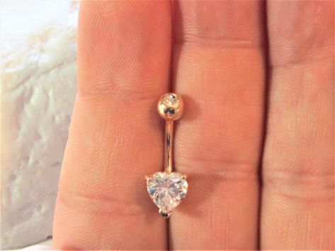 Buy Rose Gold Plated Surgical Steel Heart Cz Belly Button online on Etsy India. Shop for handmade, vintage and unique Belly Rings items from XSBodyJewelry online on Etsy Unique Belly Rings, Ear Piercings Industrial, Belly Piercings, Bellybutton Piercings, Belly Button Piercing Jewelry, Belly Piercing Jewelry, Belly Piercing Ring, Piercing Inspo, Button Piercing