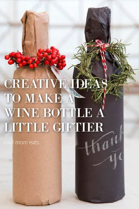 8 creative ideas for gift wrapping wine, like using kraft paper with a Christmas flourish | Terrain via Boston Mamas. | See more on CoolMomPicks.com #wine #giftwrap #holidaydiy | wine gift | champagne gift wrap | diy giftwrap | creative gift wrap ideas | christmas gift wrap ideas | hostess gifts Wine Bottle Gifts Diy, Wine Bottle Christmas Gifts Wrapping, Wine Bottle Accessories, How To Gift Wine Bottles, Gift Wrap Liquor Bottle Ideas, Wine Packaging Gift, Wraping The Bottle, How To Wrap Wine Bottles Gift Christmas, How To Wrap A Wine Bottle For Christmas