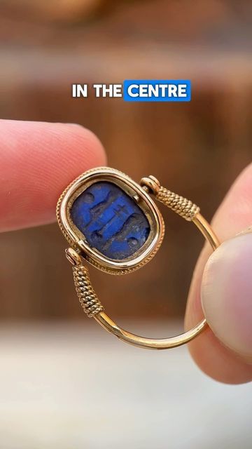 Ravensbury Antiques - Antique Jewellery Dealer on Instagram: "A vintage Egyptian gold swivel ring with a carved lapis lazuli in the shape of a scarab, inspired by ancient carved scarab rings found in archaeological excavations! 🪲  #jewellery #ancienthistory #egyptology #scarab #vintagejewelry #antiquejewelry #antiquering #goldring #jewelrydesign #fashion #design #art #historylovers" Scarab Ring, Swivel Ring, Egyptian Gold, Ancient Jewellery, Fashion Design Art, Antique Jewellery, Ancient History, Antique Rings, Lapis Lazuli