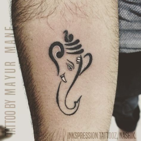 Small Lord Ganesha Tattoo. Lord Ganesha is the lord of New Beginnings, Prosperity & Remover of Obstacles. #inkspressiontattooz #getinked #ganeshatattoo #lordganesha #ganesha #smalltattoos #tattooedboys #tattooedmen #tattooaddict #nashiktattoos #tattoostudio #nashikgram #inkedboy #inkgram #inkstagram #lovefortattoos #lovetattoos #nashiktattoos #tattooinnashik #tattooshopinnashik #tattoostyle #besttattoo #besttattooinnashik Ganpati Tattoo On Neck, Small Ganesha Tattoo Design, Vinayagar Tattoo Design, Simple Ganesha Tattoo, Lord Ganesh Tattoo Designs, Ganapati Tattoo Design, Small Tattoos God, Ganapati Tattoo, Small Ganesha Tattoo