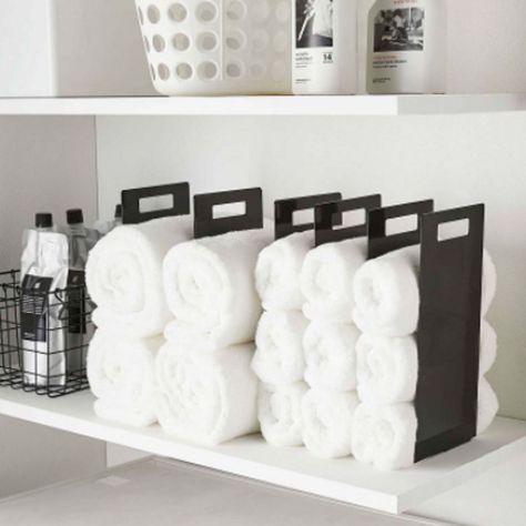 Get Your Life Together With These Must-Have Bathroom Organizing Essentials Under Sink Towel Storage, How To Organize Bathroom Cabinets, Towel Organization Bathroom, Hand Towel Storage, Under Bathroom Sink, Towel Organizer, Organize Bathroom, Bathroom Under Sink, Chic Organization