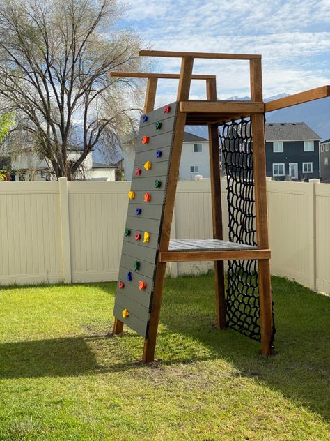 Playground DIY project for kids. Climbing wall and climbing netted rope. Diy Playground For Kids, Climbing Playground Ideas, Rope Climbing Wall For Kids, Playground Climbing Wall, Diy Garden Playground, Rope Playground Ideas, Rope Net Playground, Concrete Playground Ideas, Diy Kids Climbing Wall Outdoor