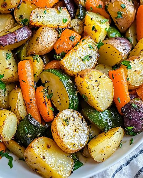 Roasted Potatoes, Carrots, and Zucchini - recipesbyava.com Roasted Zucchini And Sweet Potatoes, Crockpot Roasted Vegetables, Carrot And Potato Recipes, Mixed Veggies Side Dish, Roasted Potatoes Carrots, Carrots And Zucchini, Oven Roasted Carrots, Roasted Potatoes And Carrots, Sauteed Potatoes