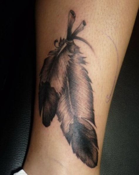 15+ Best Eagle Feather Tattoo Designs and Ideas - PetPress Native Feather Tattoos, Eagle Feather Tattoos, Feather Tattoo Meaning, Indian Feather Tattoos, Eagle Feather, Feather Tattoo Design, Eagle Feathers, Religious Tattoos, Heart Tattoo Designs