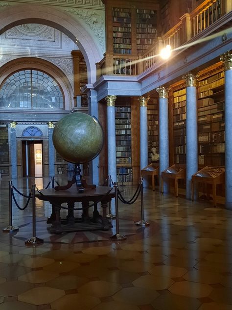 big spacious library with a big earth globe in the middle Science History Aesthetic, History Job Aesthetic, Dark Academia History Student Aesthetic, Dark Academia History Aesthetic, Geography Class Aesthetic, History Academia Aesthetic, History Lesson Aesthetic, Humanities Major Aesthetic, Ap European History Aesthetic