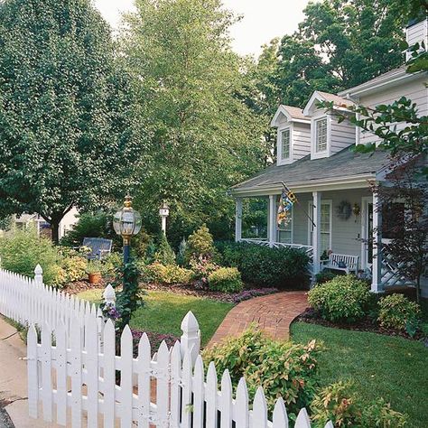 Curb appeal is important for your front yard, but having pretty landscaping is always important for the backyard too. These simple tips and ideas will help you transform your outdoor living space, big or small, into the lawn of your dreams. Brick Walkway, Front Yard Fence, Front Landscaping, White Picket Fence, Country Homes, Home Landscaping, Front Yard Garden, Garden Pathway, Garden Stuff