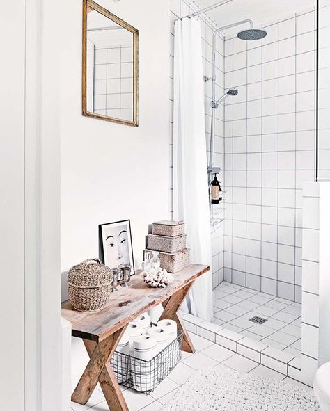 Simple accessories add personality to this small bathroom, with an old bench utilised as storage for wet room essentials. To see more of this Scandi-style home that mixes old with new, hit the link in our bio.  Styling - Luke Foged Photography - Morten Holtum/Living Inside Bathroom Storage Bench, Remodeling Bathroom Ideas, Bathroom Bench, Old Benches, Remodeling Bathroom, Square Tiles, Bench Decor, Wet Room, Hall Bathroom