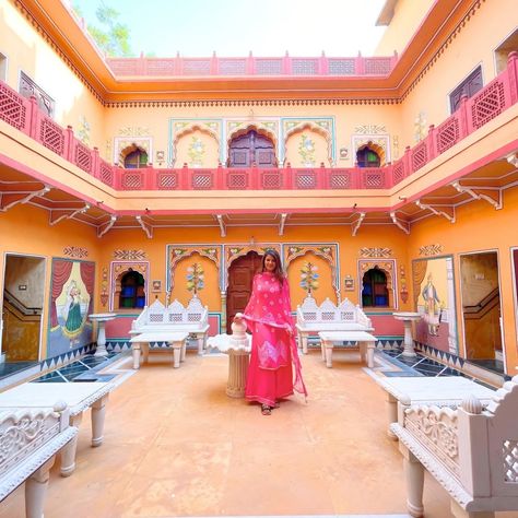 Inside a traditional haveli at Chokhi Dhani (@chokhidhaniresortjaipur), Jaipur, standing in this aangan I’m surrounded by the bold colours and the intricate beauty of Rajasthani architecture. What inspired me to post this photo was our recent home tour with Nigaar, whose home is also deeply influenced by the vibrant culture of Rajasthan. Full tour - Link in bio! 📍✨ Nigaar has artfully brought elements from her roots into her home. Her space reminds me so much of the rich heritage and archite... Rajasthani Architecture, Jaipur Fashion, Culture Of Rajasthan, Instagram Inspo, Home Tour, Jaipur, House Tours, Bold Colors, Inspire Me