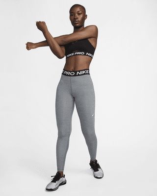 The Nike Pro Leggings are made with sweat-wicking fabric and mesh across the calves to keep you cool and dry. Soft, stretchy fabric moves with you as you sprint, lunge and stretch. This product is made with at least 50% recycled polyester fibers. Shown: Smoke Grey/Heather/Black/White Style: CZ9779-084 Mesh Panel Leggings, Nike Pro Leggings, Nike Pro Women, Nike Leggings, Black White Fashion, Nike Pros, Heather Black, White Style, Stretchy Fabric