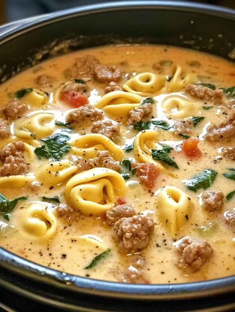 When I found this recipe, I instantly knew it was a must-try. It totally met my expectations. Super tasty!. Creamy Tortellini Soup With Sausage, Tortellini Soup Crockpot, Tortellini Soup With Sausage, Creamy Sausage Tortellini Soup, Creamy Sausage Tortellini, Italian Sausage Tortellini Soup, Dinner Date Recipes, Cheese Tortellini Soup, Pot Pasta Recipes