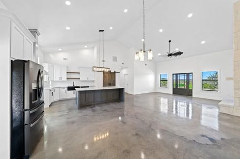 A wide polished concrete flooring kitchen Concrete Floors In House Kitchen, Stained Concrete Flooring, Indoor Concrete Floor Ideas, Polished Concrete Floor, Finished Concrete Floors, Concrete Floors In House, Concrete Stained Floors, Epoxy Floor, Metal Building Homes