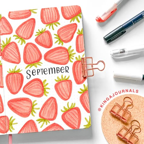 bullet journal september strawberry cover page ideas bullet journal laying on the desk filled with strawberry doodles and lettering inspiration for bullet journal beginners for your bullet journal ideas inspo page cover Bujo Gift Ideas Page, Cover Page Journal Ideas, Bullet Journal Themes 2024, Welcome To My Journal Ideas, September Journal Page, 2024 Journal Cover Page, Month Cover Page Bullet Journal, Bullet Journal Ideas Cover Page, Bullet Journal 2024 Cover Page