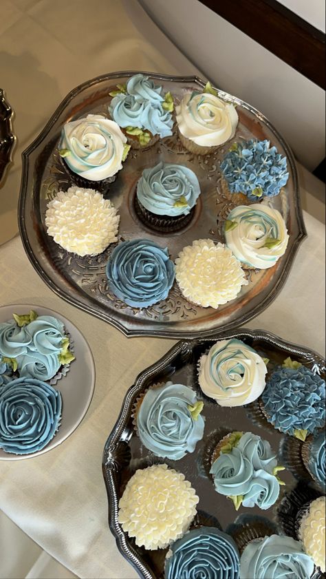 Assorted cupcakes 
Blue floral Dusty Blue Party Theme, Bridal Shower Balloon Arch Dusty Blue, Dusty Blue Shower Decorations, Wedding Shower Blue Theme, Blue Bridal Shower Table Setting, Navy Blue And White Bridal Shower Ideas, Dusty Blue Tea Party, Pale Blue Bridal Shower Ideas, Something Blue Bridal Shower Dessert Table