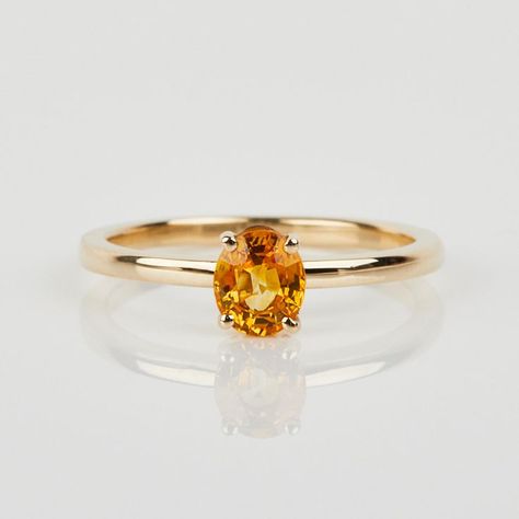 This unique one-of-a-kind handmade oval yellow citrine ring set in 14ct rose gold is perfect for the modern bride or as a stunning right-hand statement ring. All of our stones are ethically sourced and produced. Elegant Gold Citrine Rings, Luxury Elegant Citrine Rings, Oval Citrine Rings Fine Jewelry, Luxury Oval Citrine Rings, Elegant Yellow Citrine Crystal Ring, Yellow Topaz Ring, Yellow Citrine Ring, Citrine Ring Engagement, Gold Minimalist Jewelry