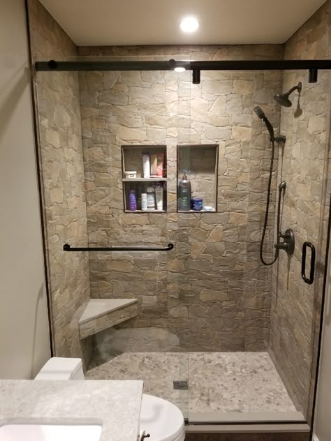 Natural Stone In Bathroom, Stone Tile Shower Wall, Shower Remodel Brown Tones, Showers With River Rock Floors, Small Stone Shower Ideas, Bathroom Floor And Shower Tile Combos, Bathroom With Shower Cabin, Shower Rock Tile Ideas, Farmhouse Master Bathrooms With Walk In Showers