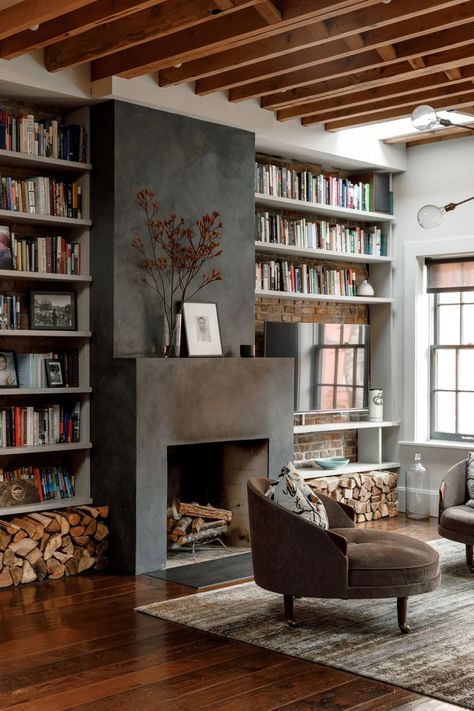 Inside Actor Maura Tierney's Reinvented West Village Town House | Architectural Digest Home Interior Design Dark Floor, Modern Cosy Kitchen Design, Books Next To Fireplace, Bookshelves Around Woodstove, Mid Century French Country, Bookcase By Fireplace, Contemporary Dark Academia, Town House Interior Design Ideas, Architectural Digest Kitchens