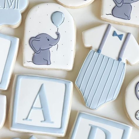 Taylor Schulteis on Instagram: "Perfect cookies for a baby boy shower! 🥰• • • • • #cookies #cookiedecorating #instacookies #instacookie #cookiesofinstagram #sweets #bakery #cookiesofig #sugarcookies #sweetone #buttercream #royalicingcookies #royalicing #cakesofinstagram #bakemyday #wilton #lemoncookies #orangecookie #onesie #onesies #lemon #onesiecookie #babyshowers #babyshower #lemonbabyshower #babyshowerparty #babyshowercookies #genderneutral #babygirl  #babyboy" Baby Sugar Cookies Decorated, Baby Boy Cookies Decorated, Baby Shower Boy Cookies, Baby Shower Cookies For Boy, Baby Boy Shower Cookies, Boy Baby Shower Cookies, Baby Boy Cookies, Cookies Design, Onesie Cookies