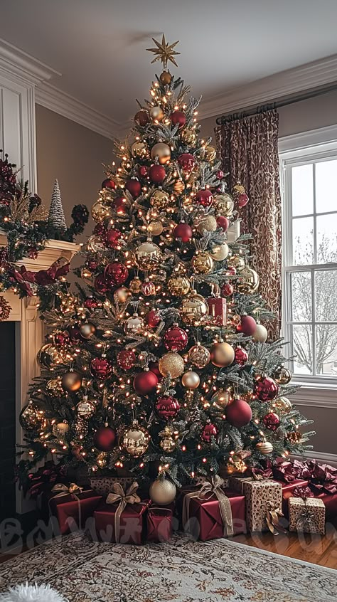 🎄✨ Dive into the festive spirit with this magnificent Christmas tree adorned in classic red and gold hues. The shimmering ornaments and twinkling lights create a warm, cozy atmosphere. Perfect for creating magical holiday moments! 🎁🎇 #Christmas #holiday #decor #festive #cozy #red #gold #lights #ornaments #holidayvibes #home #inspiration 🏠🎅❤️ Red Gold Ornaments Christmas Tree, Gold And Red Xmas Tree, Family In Front Of Christmas Tree, Gold Red Christmas Decorations, Red And Gold Christmas Living Room, Christmas Tree Decorations Classic, Dream Christmas Decor, Christmas Tree Color Schemes Gold, Cranberry And Gold Christmas Tree