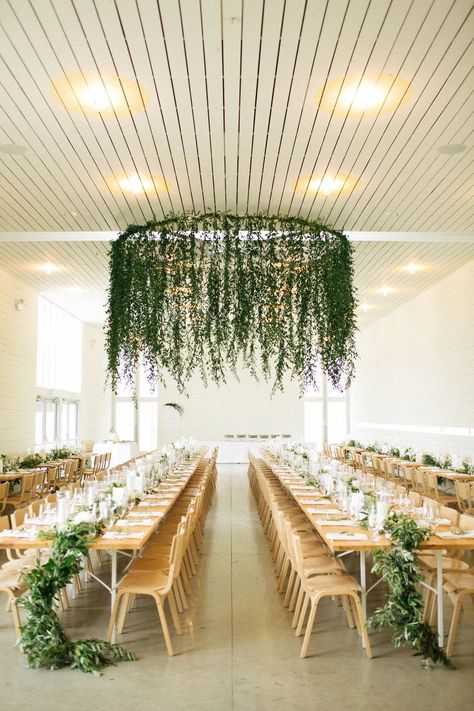 hanging circular frame with greenery vines dangling down Classic Wedding Centerpieces, Modern Dinner Table, Prospect House, Greenery Wedding Decor, Tulip Wedding, Garden Wedding Reception, Budget Friendly Wedding, Spring Wedding Inspiration, Geometric Wedding