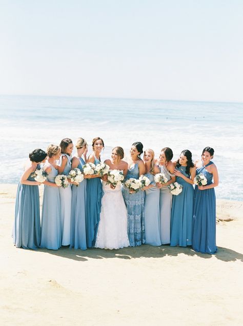 Bring That Blue And White Beach Theme Into Your Garden Wedding Beach Wedding Dresses Bridesmaid, Pretty Beach Weddings, Beach Wedding Aesthetic Bridesmaid, Light Blue Different Bridesmaid Dresses, Cute Summer Wedding Ideas, Ocean Wedding Bridesmaid Dresses, Summer Beach Wedding Bridesmaid Dresses, Blue Wedding Beach Theme, August Beach Wedding