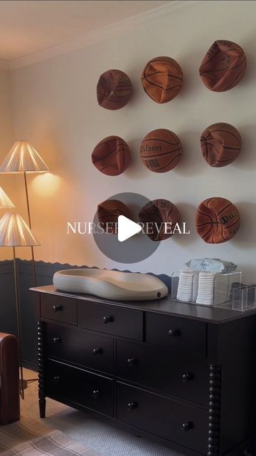 Rachel Meaders | Amazon Finds on Instagram: "Blazes nursery reveal - vintage sports!🏉🥹   We have always loved the idea of having a sports themed nursery! There was so much wall space to fill in here since we decided against wallpaper, and I’m so happy we did! It forced us to get creative with the art and pieces on the walls. I couldn’t be happier with how it turned out!🙌🏼🏀  #nursery #nurserydecor #nurserydesign #nurseryinspo #nurseryroom #nurseryideas #nurseryinspiration #nurserydecoration #vintagesports #boynursery #nurseryboy #boyroom #boyroomdecor #toddlerboy #nurseryreveal #nurserygoals #amazonfinds #amazonmusthaves #nurseryproject #nurserydiy #diynursery" Vintage Sport Theme Nursery, Sporty Nursery Ideas, Modern Sports Nursery, Sport Nursery Ideas Boy, Retro Sports Nursery, Neutral Sports Nursery, Rustic Sports Nursery, Sports Themed Nursery For Boys, Vintage Basketball Nursery