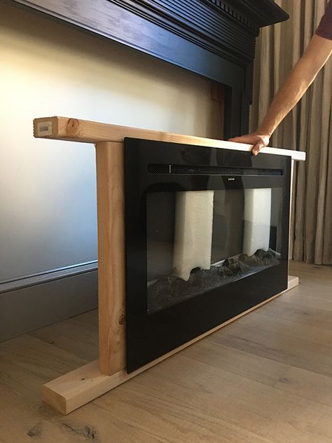 Electric Fireplace Hanging On Wall, Insert Electric Fireplace, Office Electric Fireplace, Diy Insert Fireplace, How To Frame Out A Fireplace, Ikea Diy Fireplace, Diy Changable Art Frame, Electric Fireplace In Basement Ideas, Electric Fireplace With Mantle Surround