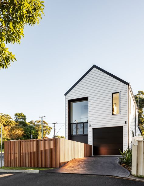 Barn by James Hardie • A contemporary take on traditional Nordic architecture, Barn by James Hardie – one of seven housing design styles identified in the company’s Modern Homes Forecast 2024 – is stunning in its simplicity.  #jameshardie #nordichomes #nordicarchitecture #homebuilders #suburbanhomes #houseconstruction #australianhomes #houseinspo #amazinghomes #timbercladding #architecturelovers #scandinavianhomes Garage Front Of House, Cladding House Exterior, Modern Windows Exterior, Horizontal Cladding, Extension Exterior, Modern Barn Style, Nordic Architecture, Dark Window, Weatherboard House