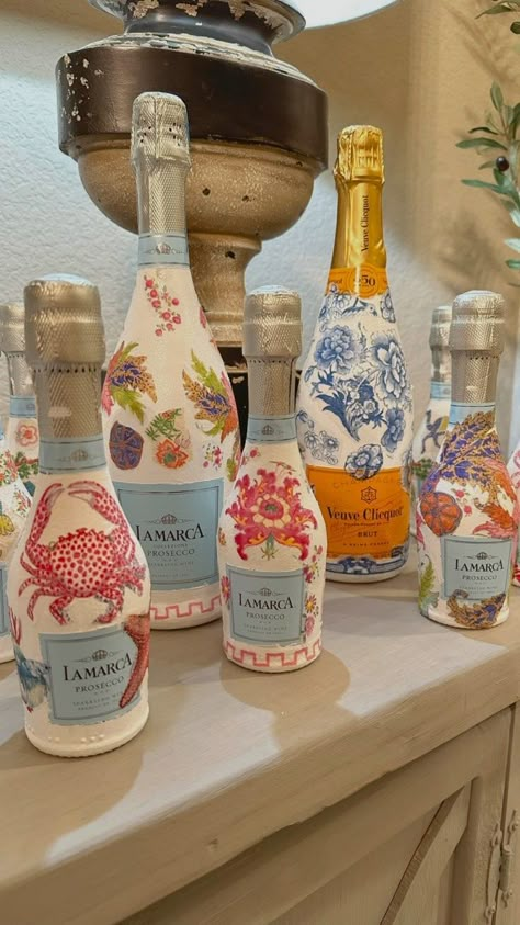 These decorative bottles make the perfect gifts and it’s so easy to make. Whether you gift to a friend or hostess, this also could be a fun… | Instagram Diy Painting Bottles, Decorating Liquor Bottles, How To Paint A Wine Bottle, Modge Podge Wine Bottle, Little Christmas Gifts For Friends, Decopage Ideas Wine Bottles, Decorative Bottles Ideas, Champagne Decorations Bottle, Painted Alcohol Bottles