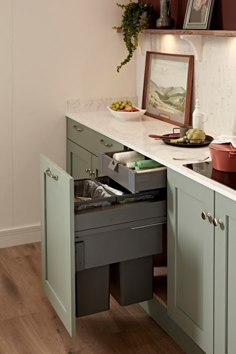 Looking to keep your green kitchen ideas clean and tidy? Look no further than this kitchen cleaning hack. Howdens Kitchen Bins allow recycling and waste products to be easily separated in a single unit. Available in several different sizes, this kitchen storage inspiration can be tailored to suit your available kitchen design. Simply add a shaker kitchen cabinet door to complete the look. Kitchen Units In Bathroom, Kitchen Cupboard Internals, Kitchen Bin Cupboard, Kitchen Cupboards Inside, Slimline Kitchen Cabinets, Howdens Kitchen Island Ideas, Bin Cupboard Kitchen, Clever Small Kitchen Ideas, Built In Bin Kitchen