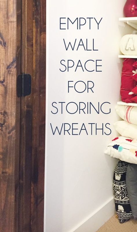 Inexpensive Wreath Storage Idea Storing Wreaths In Garage, Wreath Storage Ideas Easy Diy, Store Wreaths Ideas, Best Way To Store Wreaths, Wreath Organization Storage Ideas, Wreath Making Supply Storage, Storing Wreaths Ideas, Wreath Storage Ideas Organizing, How To Store Wreaths