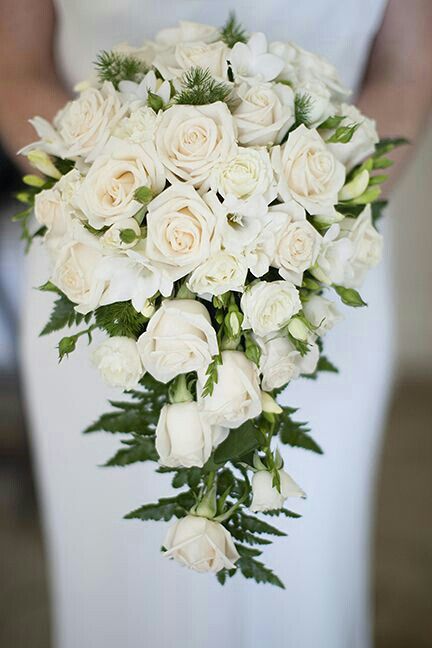 Elegant Cascading Bridal Bouquet Showcasing: White Roses, White Freesia, Evergreen & Green Leather Leaf Fern>>>> Cascading Bridal Bouquets, Bridal Bouquet Fall, White Bridal Bouquet, Cascade Bouquet, White Wedding Bouquets, Deco Floral, White Bouquet, Ideal Wedding, Bride Bouquets